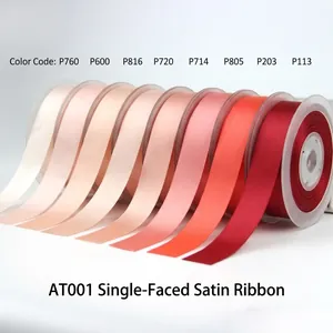 Polyester satin ribbon rolls in gradient red and pink shades for gift wrapping decoration