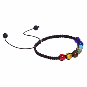 Adjustable 7 chakra braided bracelet featuring volcanic lava stones and colorful beads