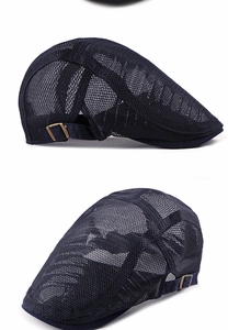 Detail of dark blue mesh beret with breathable polyester fabric and adjustable metal buckle