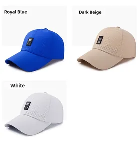 Detailed texture of breathable mesh baseball caps in royal blue, dark beige, and white colors