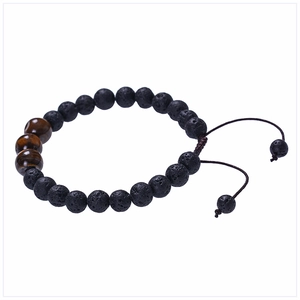 8mm Lava Rock and Tiger Eye bead bracelet with adjustable hand-woven cord on white background
