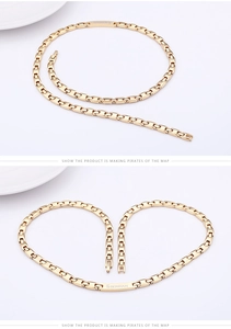 Detail of golden stainless steel chain with heart shape and engraved BERCIAN nameplate