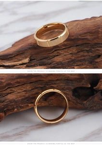Macro view of gold stainless steel ring with brushed surface and polished interior