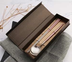Pink and silver stainless steel cutlery set with spoon and chopsticks in a brown gift box