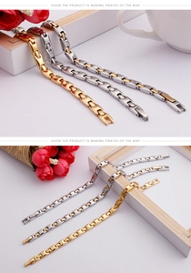 Detailed view of titanium steel curb chain bracelets in gold, silver, and two-tone finishes