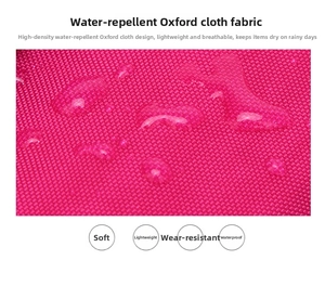 Close-up of waterproof rose pink oxford fabric showing droplet resistance and dense texture