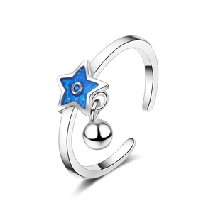 Minimalist silver open ring with blue enamel star and a small hanging bell detail