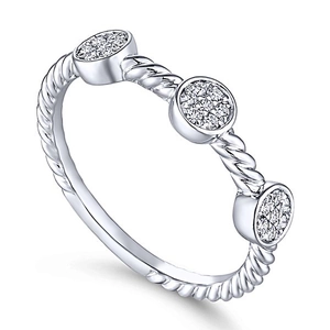 Close-up of silver twisted rope ring with three pavé-set round zircon stone clusters