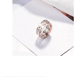 Detail of S925 sterling silver ring featuring hollow cloud patterns and rose gold inner band