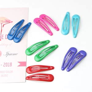 Set of 12 colorful candy-colored metal snap hair clips for women and kids on white background
