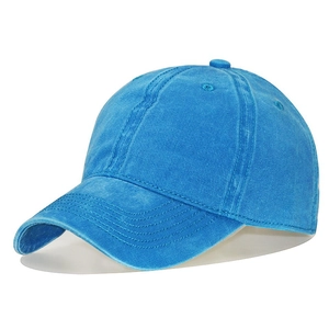 Detailed close-up of royal blue washed cotton baseball cap with classic 6-panel stitching