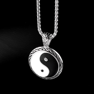 Polished silver stainless steel necklace featuring a classic Yin Yang Tai Chi pendant