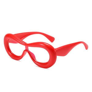 Avant-garde oversized red chunky square frame glasses with a polished glossy finish