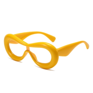 Futuristic bright yellow thick frame oversized fashion glasses for street style