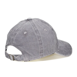 Detail view of washed cotton baseball cap in grey with adjustable metal buckle