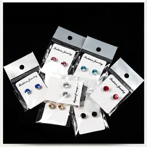 Set of colorful magnetic stud earrings with round cut crystals in seven vibrant colors