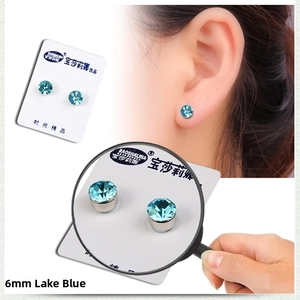 Detailed view of 6mm lake blue magnetic stud earring with faceted gemstone finish