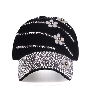 Women's black baseball cap with sparkling silver rhinestones and three 3D white flower motifs