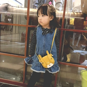 Charming yellow cartoon animal crossbody bag for kids shown on a little girl model