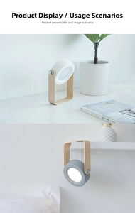Detail of minimalist foldable lantern lamp with wood handle in white and grey