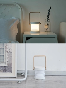 Portable telescopic lantern lamp with wood handle showing open and closed states