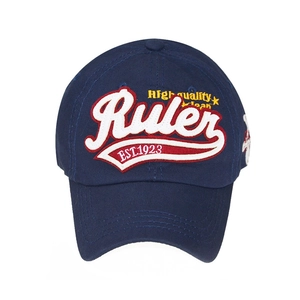 Detailed close-up of 3D embroidery and twill cotton texture on navy blue baseball cap