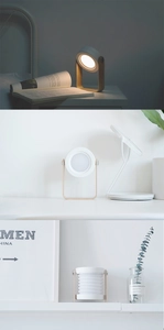 Close-up of portable wooden handle lamp showing its foldable and telescopic design features