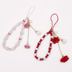 Short phone charms with beads, rhinestones, fabric flowers and pearls in pink and red