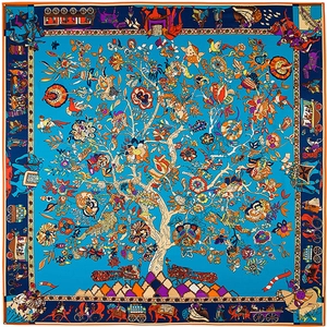 Flat lay of silk scarf with blue tree of life pattern and ethnic Indian style illustrations
