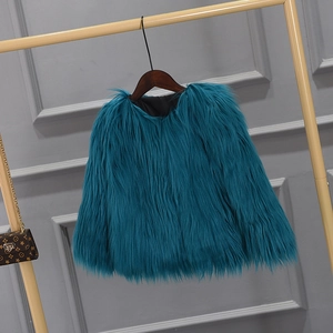 Detail of teal faux fur coat showing soft plush texture and smooth black inner lining