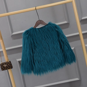 Detail of teal faux fur girl's coat texture on a wooden hanger with plush finish