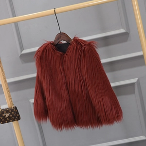 Detail of soft faux fur texture in deep wine red with premium silky black lining