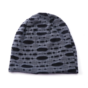 Dual-tone dark grey and black knitted beanie with breathable laser-cut hollow design