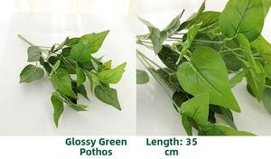 Detailed view of 35cm realistic faux Pothos leaf with durable glued coating finish