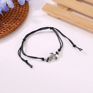 Retro handmade black woven turtle anklet with silver sea turtle charm and beads
