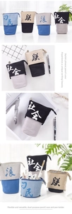 Detailed view of telescopic canvas pencil cases in four colors showing pop-up function