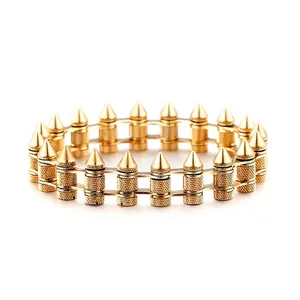 Punk style gold double chain bracelet with vertical spikes in a bicycle chain design
