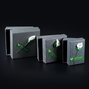 Minimalist grey stone texture jewelry gift box set with white calla lily and labels