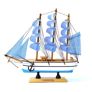 Mediterranean blue and white striped wooden sailboat model on a solid wood base