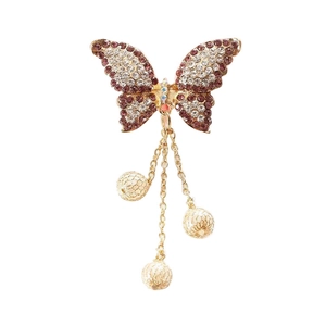 Sparkling pink butterfly brooch with gold plating and long triple tassel chains