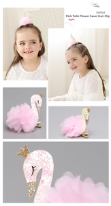 Detail of pink swan hair clip with mesh flowers and golden crown on metal duckbill clip