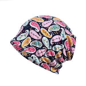 Navy blue paisley print knit beanie hat for women featuring warm lining for winter season