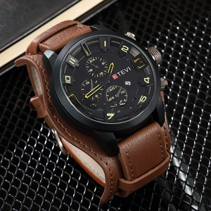Detail of dark brown leather strap and black alloy case of K TEVI men's sport watch