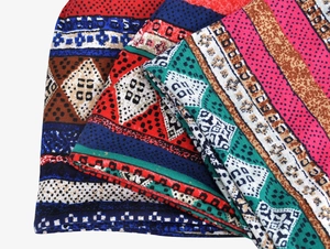 Detailed macro view of the ethnic print fabric with geometric patterns and soft texture