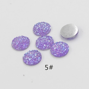Macro view of 12mm purple star resin rhinestones for DIY jewelry and nail art