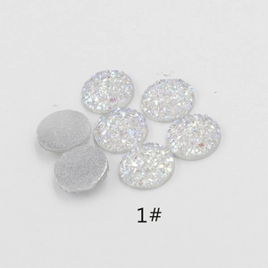Macro view of 12mm white AB resin druzy rhinestones with flat back for DIY jewelry