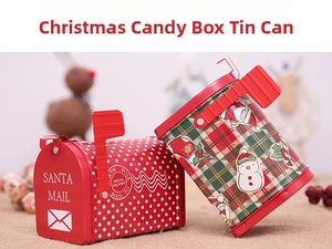 Close-up of festive Christmas tin boxes with Santa Mail mailbox and snowman patterns