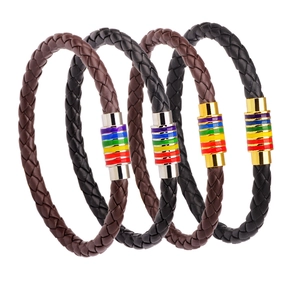 Detail of rainbow magnetic clasp and woven leather bracelet texture in black and brown