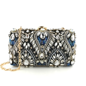 Exquisite black beaded evening clutch bag with intricate silver and blue rhinestone embroidery