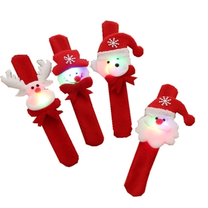 Set of 4 glowing Christmas slap bracelets with LED deer, snowman, bear and Santa for kids